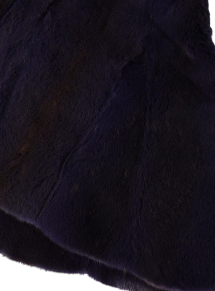 a close up of a black hat on a white background