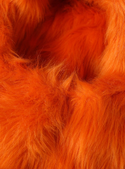 a close up of an orange furry material