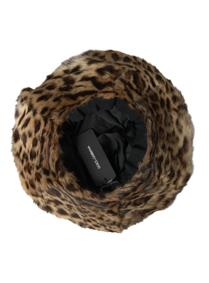 a leopard print hat with a black object in it