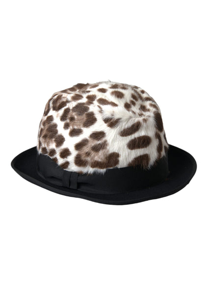 a brown and white hat with spots on it