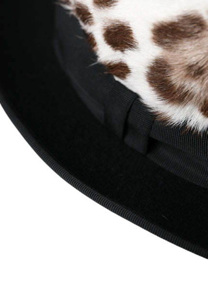 a close up of a giraffe print hat