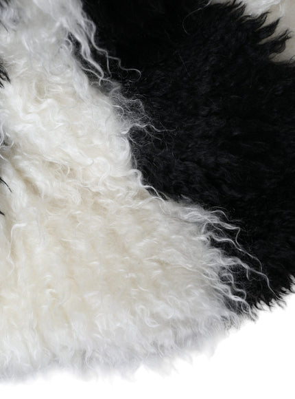 a close up of a black and white animal fur