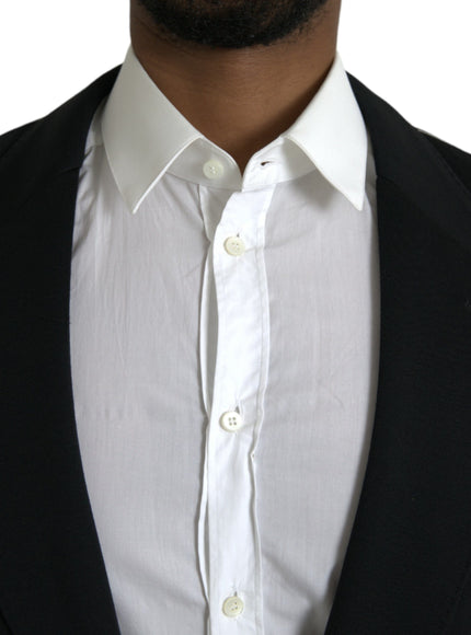 Close-up of white shirt under black wool blazer