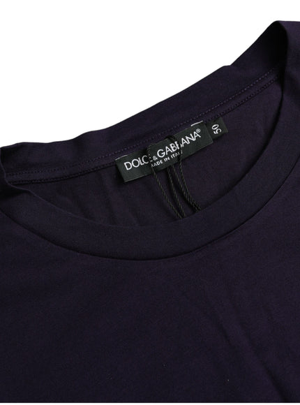 a black t - shirt with a tag on it