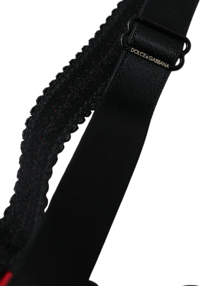 a close up of a black strap on a white background