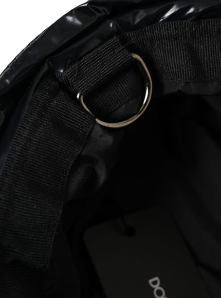 a close up of a black bag with a cell phone in it