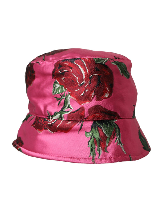 a pink hat with red roses on it