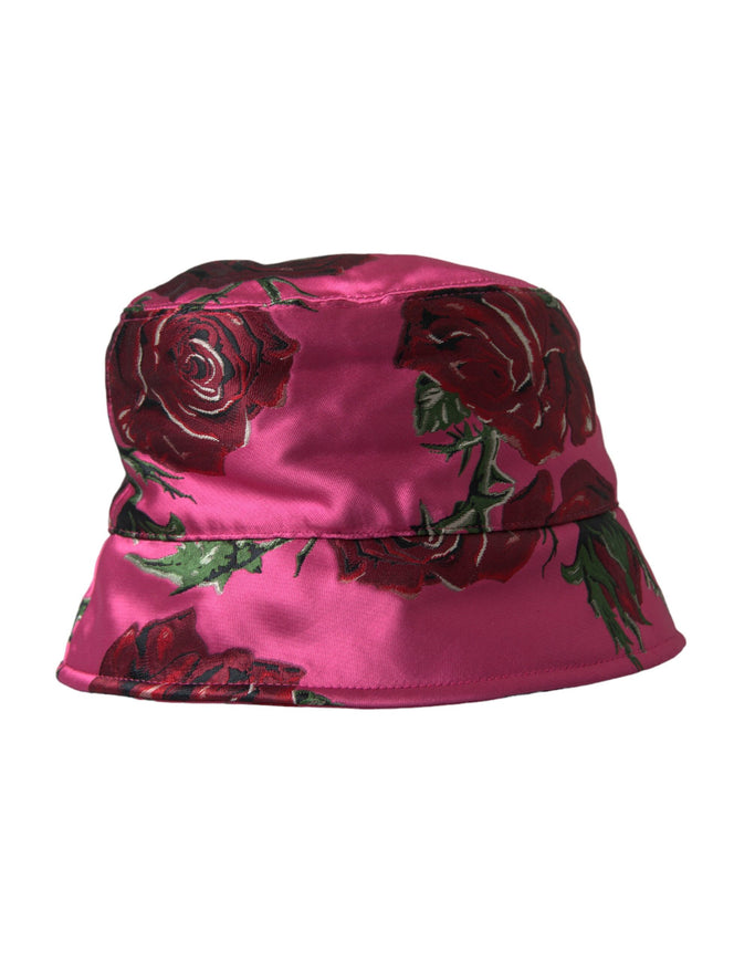 a pink hat with red roses on it