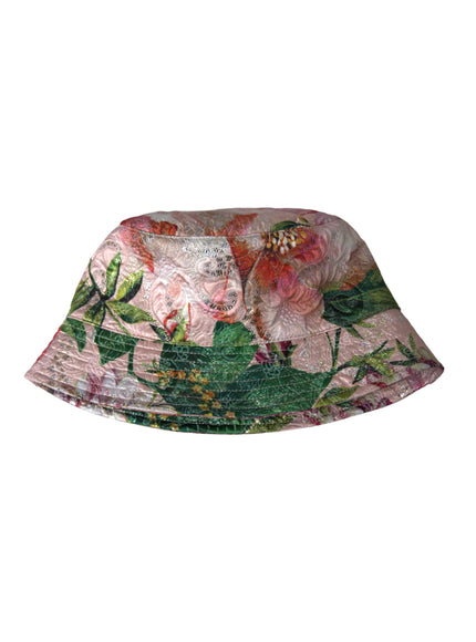 a pink hat with a flower pattern on it