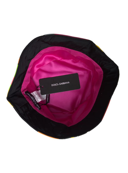 a black and pink backpack with a tag on it