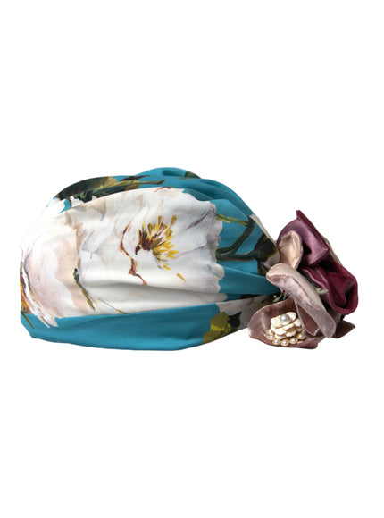 a hat with a flower on the side of it