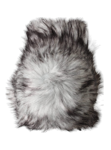 a close up of a fur ball on a white background