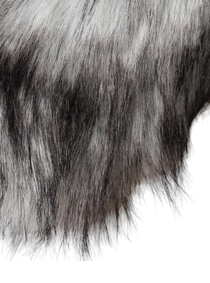 a close up of a black and white animal's fur