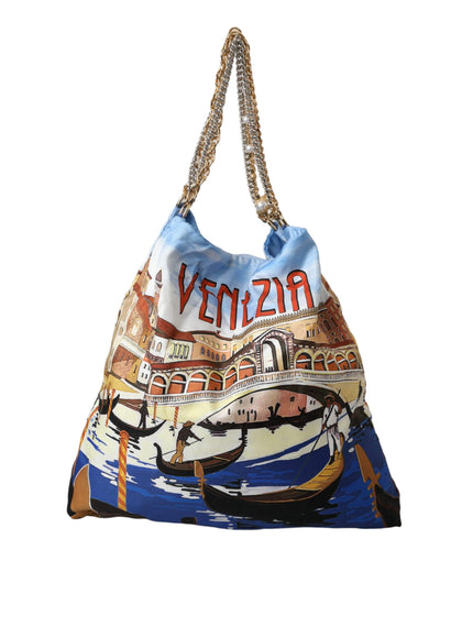 a handbag with a picture of a boat on it