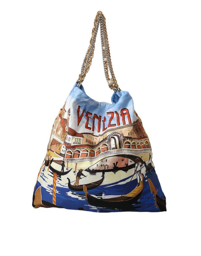 a handbag with a picture of a boat on it