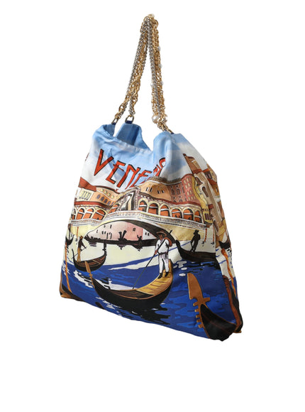 a handbag with a picture of a boat on it