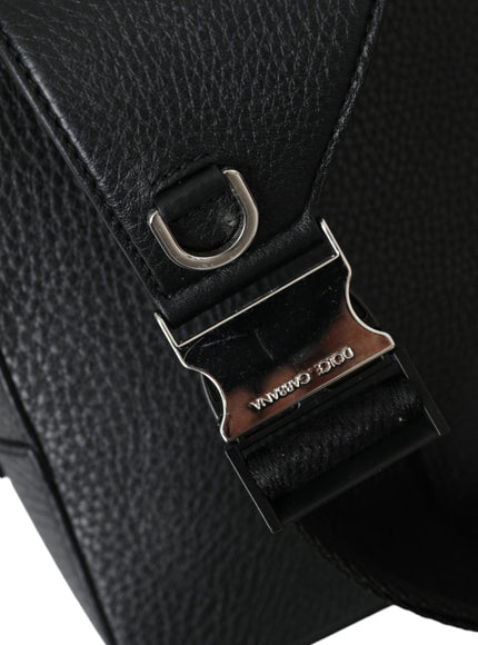 a close up of a black purse with a metal buckle