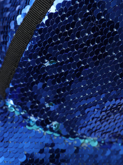 a close up of a blue sequin bag