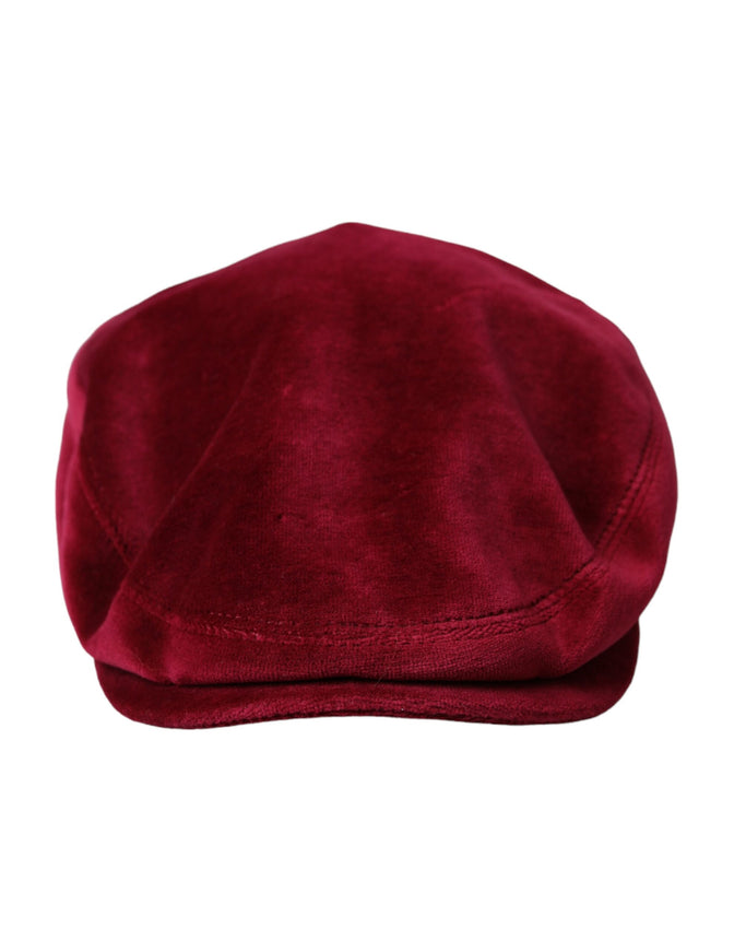 a close up of a red hat on a white background