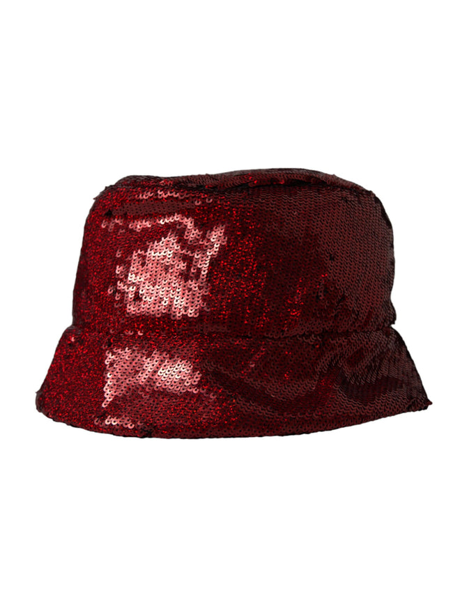 a red sequinized hat with a face on it