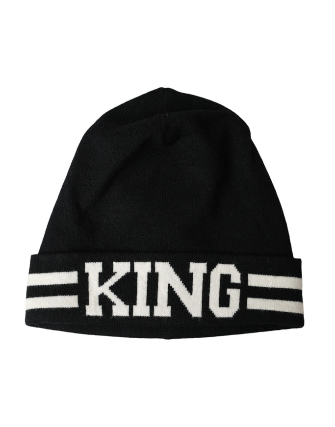 a black beanie with the word king on it