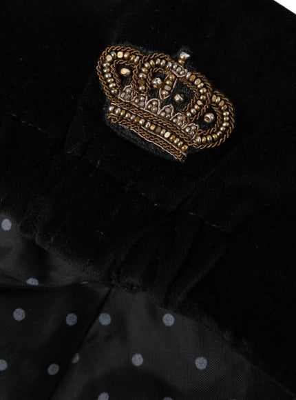 a black jacket with a gold crown on it