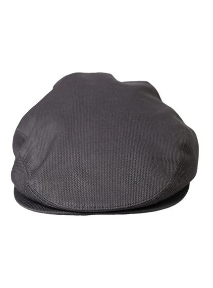 a close up of a black hat on a white background