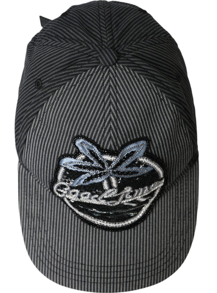 a black and white hat with a blue dragon embroidered on it