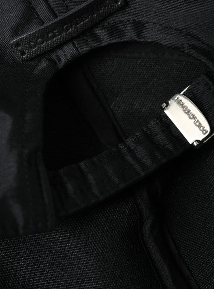 a close up of a black backpack with a tag on it