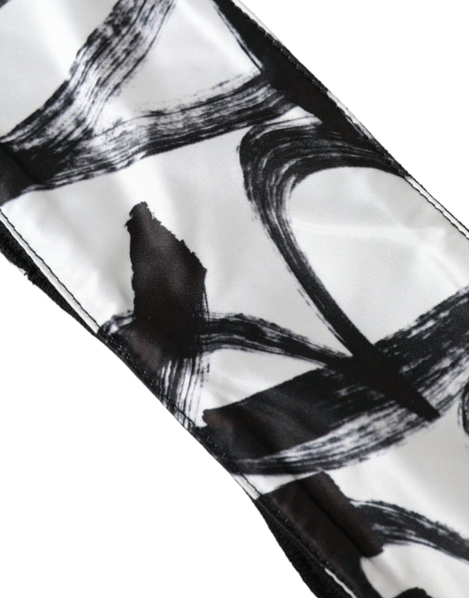 a tie with black and white designs on it