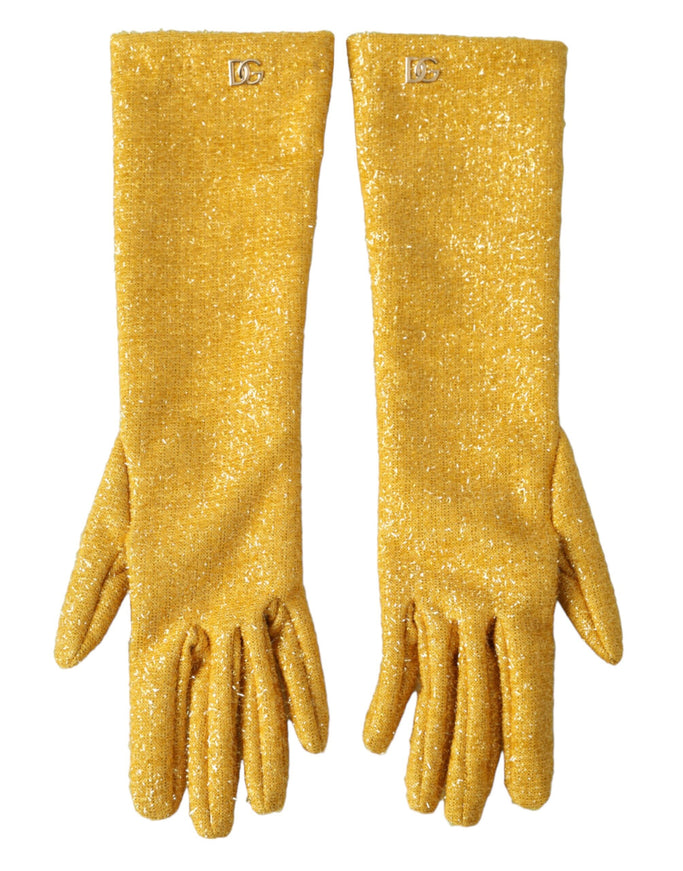 a pair of yellow gloves on a white background