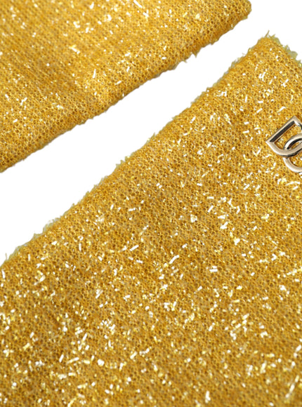 a close up of a gold colored tie