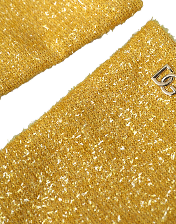 a close up of a gold colored tie