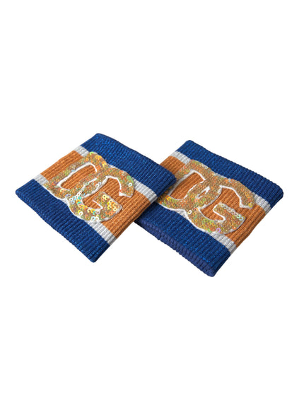 a pair of blue and orange coasters with a tiger on it