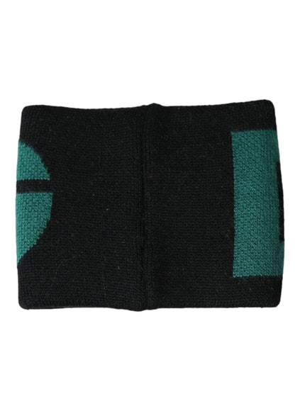 a close up of a black and green wristband