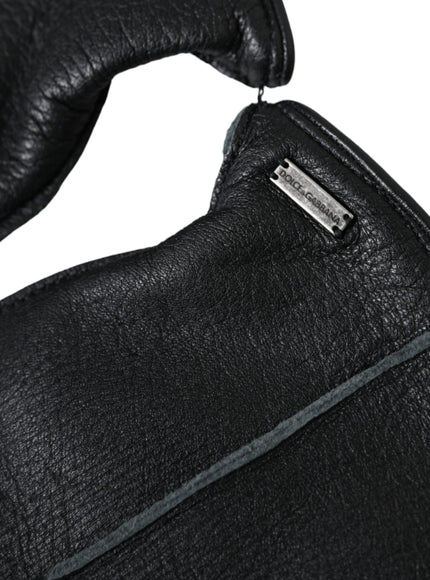 a close up of a black leather purse