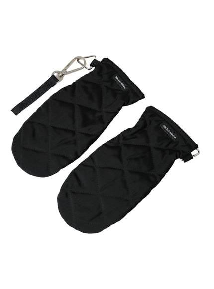 a pair of black oven mitts on a white background