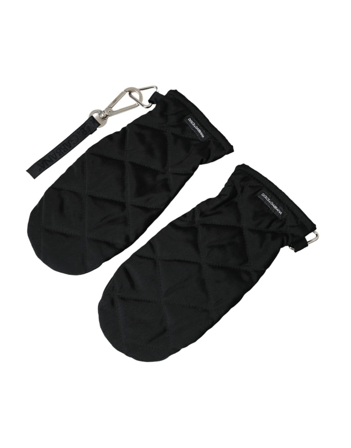 a pair of black oven mitts on a white background