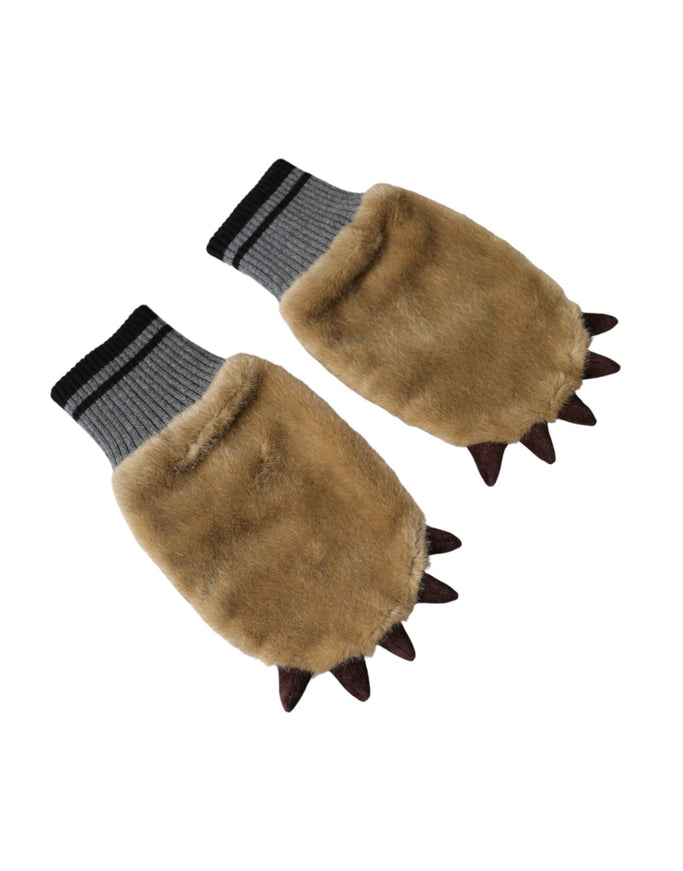 a pair of gloves with spikes on them