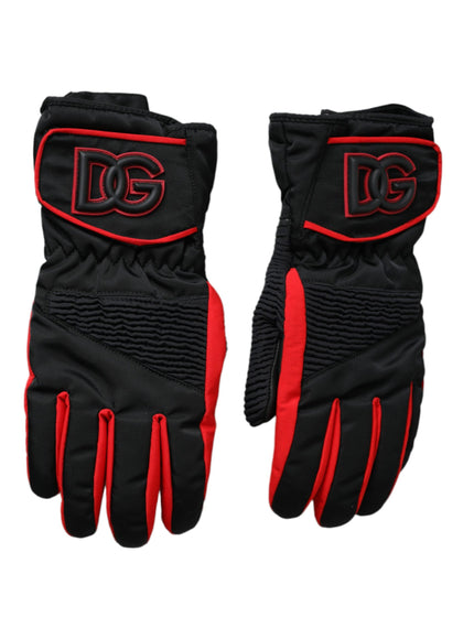 a pair of black and red gloves on a white background