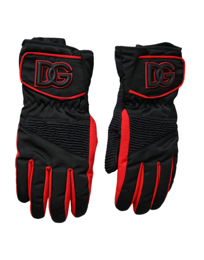 a pair of black and red gloves on a white background