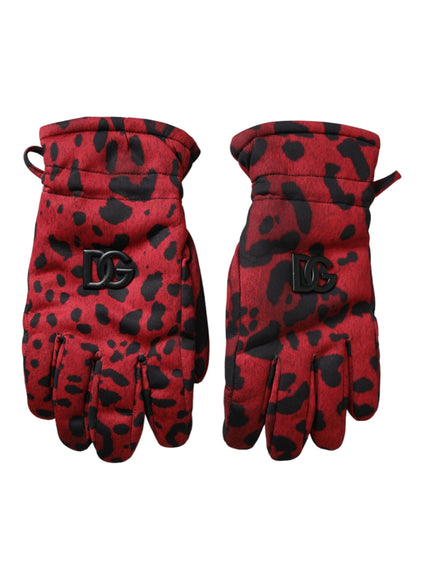 a pair of red and black gloves on a white background