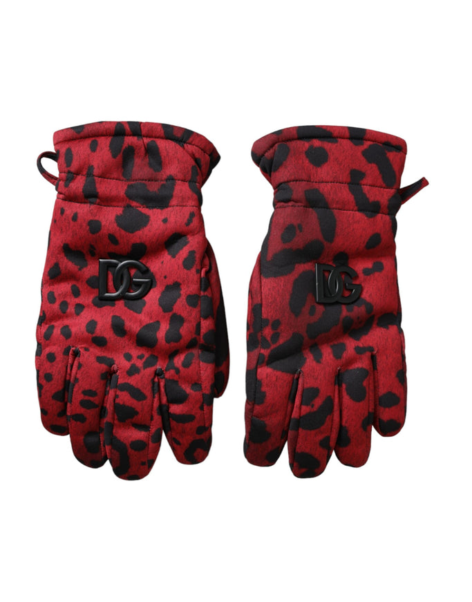 a pair of red and black gloves on a white background