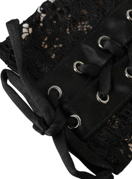 a close up of a black purse with lace