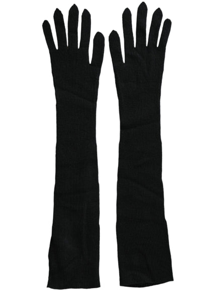 a pair of black gloves on a white background