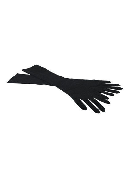 a pair of black gloves on a white background