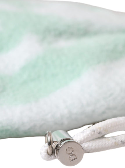 a close up of a towel with a ring on it