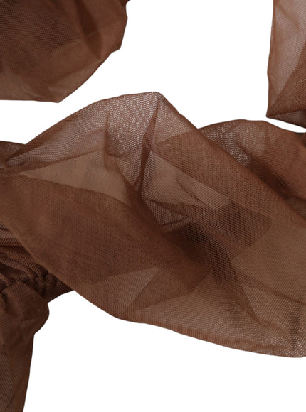 a close up of a brown sheer fabric