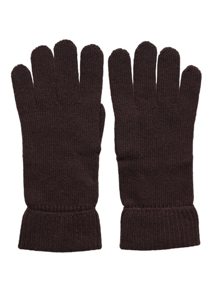 a pair of brown gloves on a white background