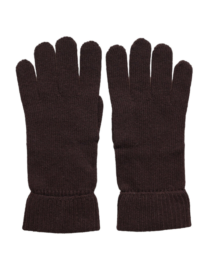 a pair of brown gloves on a white background